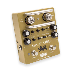 Gainlord guitar effects pedal with gold casing on a white background